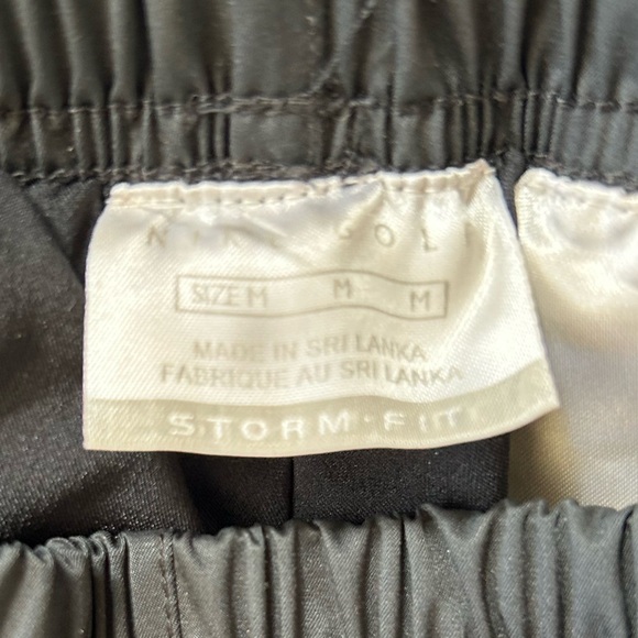 Nike | Women’s Black Nike Golf Storm Fit Pull On Rain Pants, Snap Hem, size M - Picture 7 of 15
